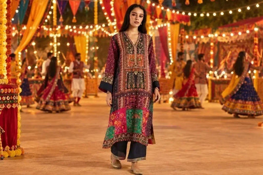 Woman wearing a multicolour embroidered kurta set with festive ethnic detailing for Navratri celebrations.